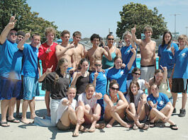 Tiger varsity swimmers end season with unbeaten record