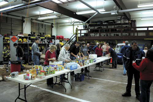 Rotary teams with Interact club to deliver Christmas: Annual program provides gifts, food to less fortunate families