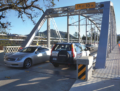 Historic bridge open for traffic; work continues