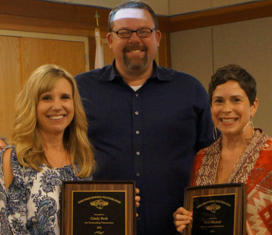 Beth and Mitchell honored by city for volunteerism
