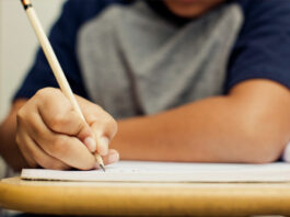 Students flock to schools reopened in wake of firestorm