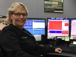 Veteran police dispatcher is a voice of calm in troubled times