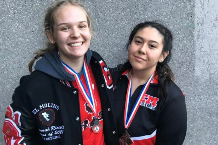 Lady wrestlers Hannah Ricioli and Lily Marrufo