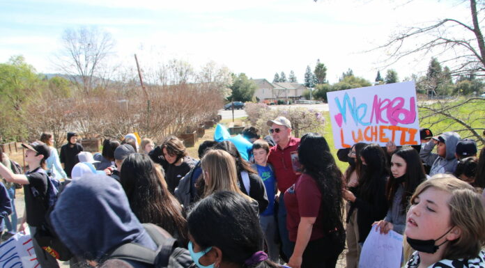 ‘No Lucchetti, no school’: Students walk out in support of Washington principal