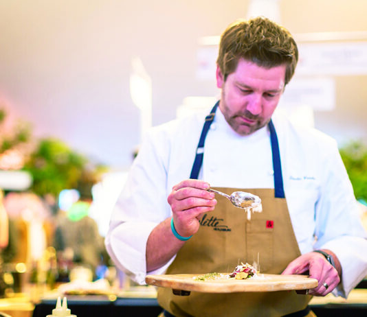 Chef Dustin Valette prepares a dish