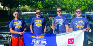 Members of the Healdsburg Police Department who participated in the June 2022 Law Enforcement Torch Run for Special Olympics. From left, Angel Rodriguez, Lt. Luis Rodriguez, Chief Matt Jenkins with torch, and Officer Nick Doherty.