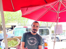 Sam works the Middleton Farm produce booth at a recent Tuesday Farmers’ Market. He says Middleton Farm has attended the Healdsburg Farmers’ Market since 1989.
