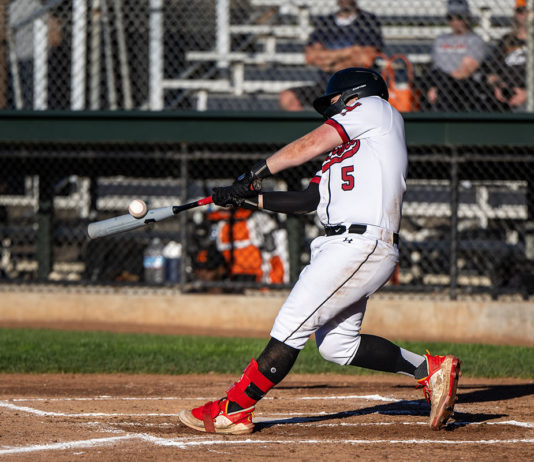 Healdsburg baseball player hits home run