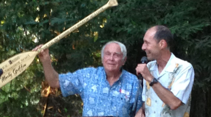 Two men with paddle
