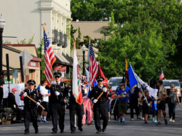 Here Comes the Twilight Parade! Parade with flags