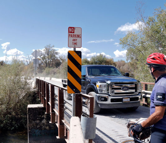 Asti to Get its Permanent Bridge Bike and truck at bridge