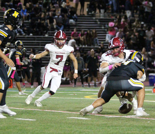 Greyhounds Seek Footing in Mountain Division Rowland forces a fumble