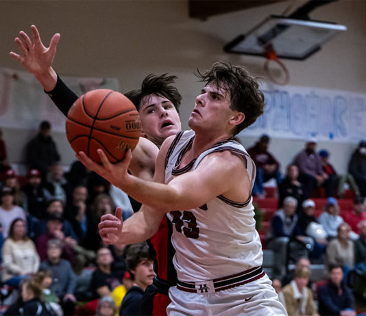 Thatcher Little (33) goes in for points