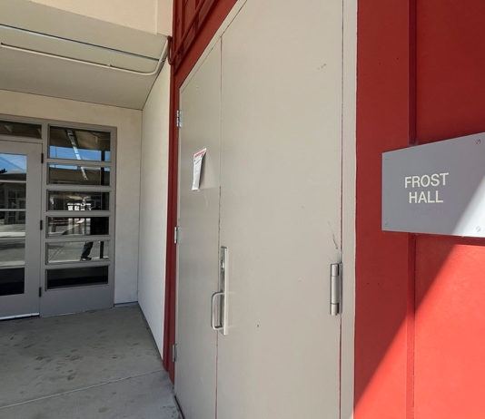 The Frost Hall sign on what is now the Drew Esquivel Gym