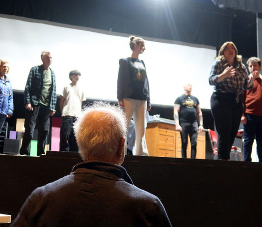 Director Joe Gellura watches rehearsals for 'Bridges of Madison County'