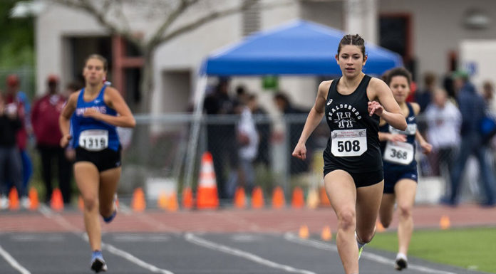Jane Perrill running the 400m at Viking classic.