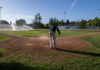 Raking the infield dirt at Rec Park