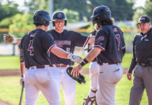 Jacob French scores a run