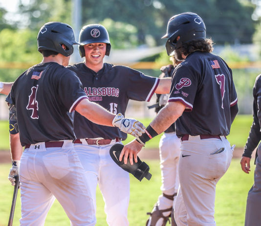 Jacob French scores a run