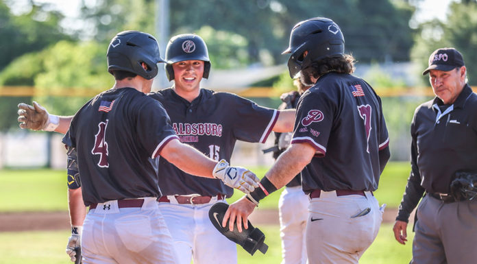 Jacob French scores a run