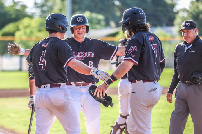 Jacob French scores a run