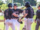 Jacob French scores a run