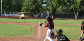 SECOND-INNING SLUGGER Jonathan Kim hits the first home run of the year