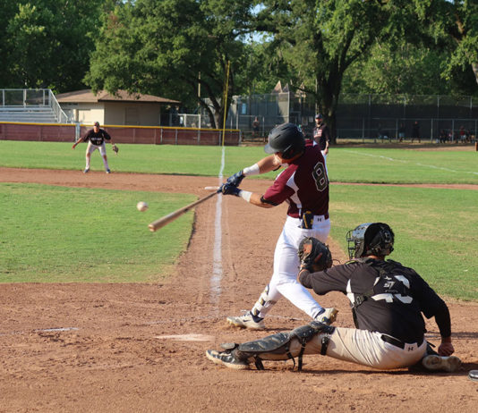 SECOND-INNING SLUGGER Jonathan Kim hits the first home run of the year