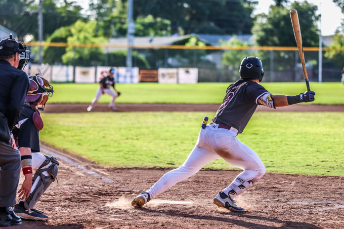 Prune Packers baseball action