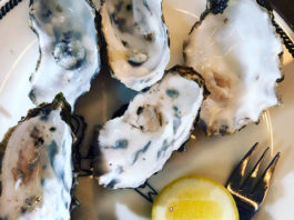 Oysters on a plate with lemon
