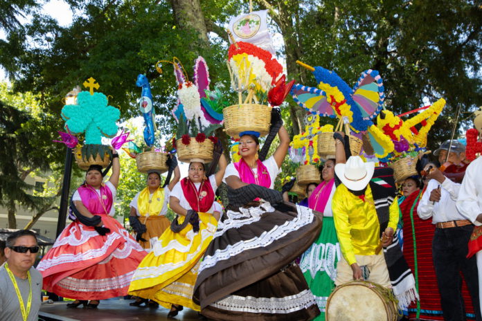 Oaxacan women dancing at Guelaguetza in Healdsburg