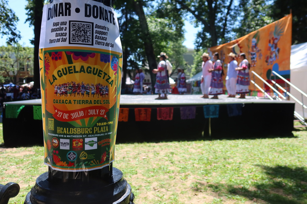 Guelaguetza sign at the Plaza stage 
