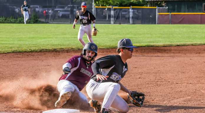 Baserunner Logan Sutter slides into third