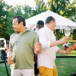 Men dancing at La Crema