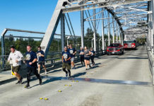 Police carry the torch