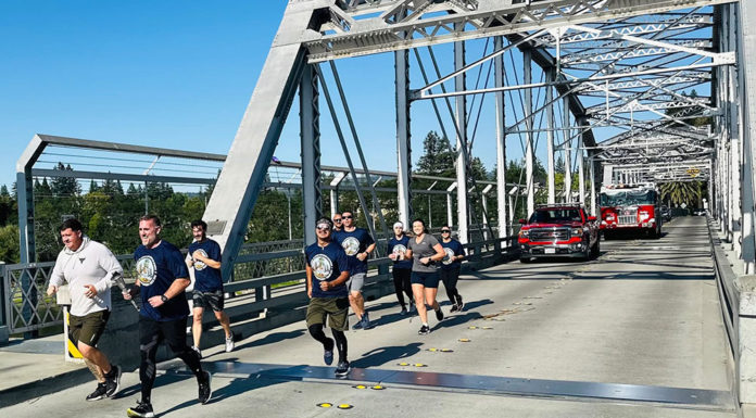 Police carry the torch