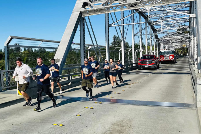 Police carry the torch