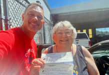 Boosters hand over the checks