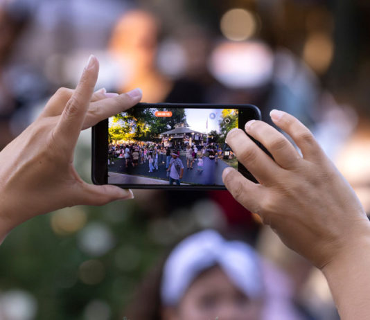 Cell phone shooting video at Healdsburg Plaza