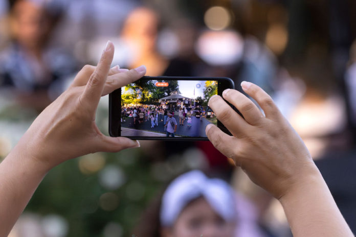 Cell phone shooting video at Healdsburg Plaza