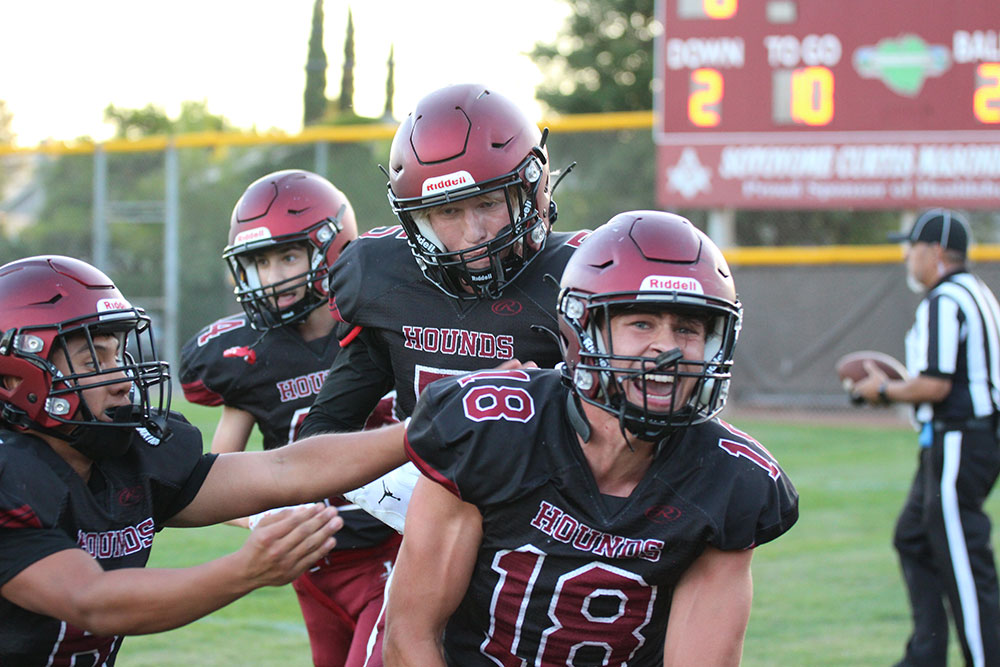 enior Max Morris (18) and teammates celebrate his second-quarter touchdown