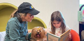 Reading to a dog at Healdsburg Library