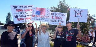 Healdsburg joins in national No Kings protest No KIngs protestor holding signs