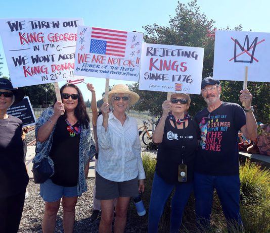 Healdsburg joins in national No Kings protest No KIngs protestor holding signs
