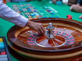 Man in casino playing roulette