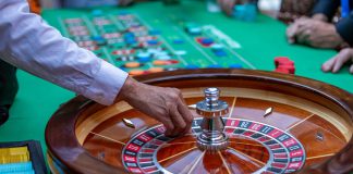 Man in casino playing roulette