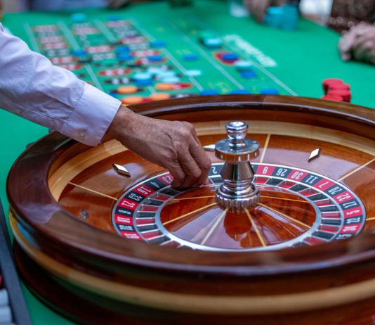 Man in casino playing roulette