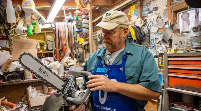 Local ‘rock star’ on art tour Sculptor T Barny with diamond saw