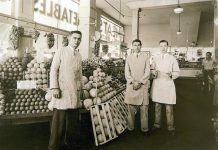 Staff of Jay Hassert's fruit and vegetable market, house, 1930s.