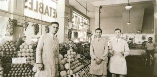 Staff of Jay Hassert's fruit and vegetable market, house, 1930s.